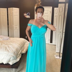 NWT turquoise blue chiffon floor length gown. Fits sizes 14-16